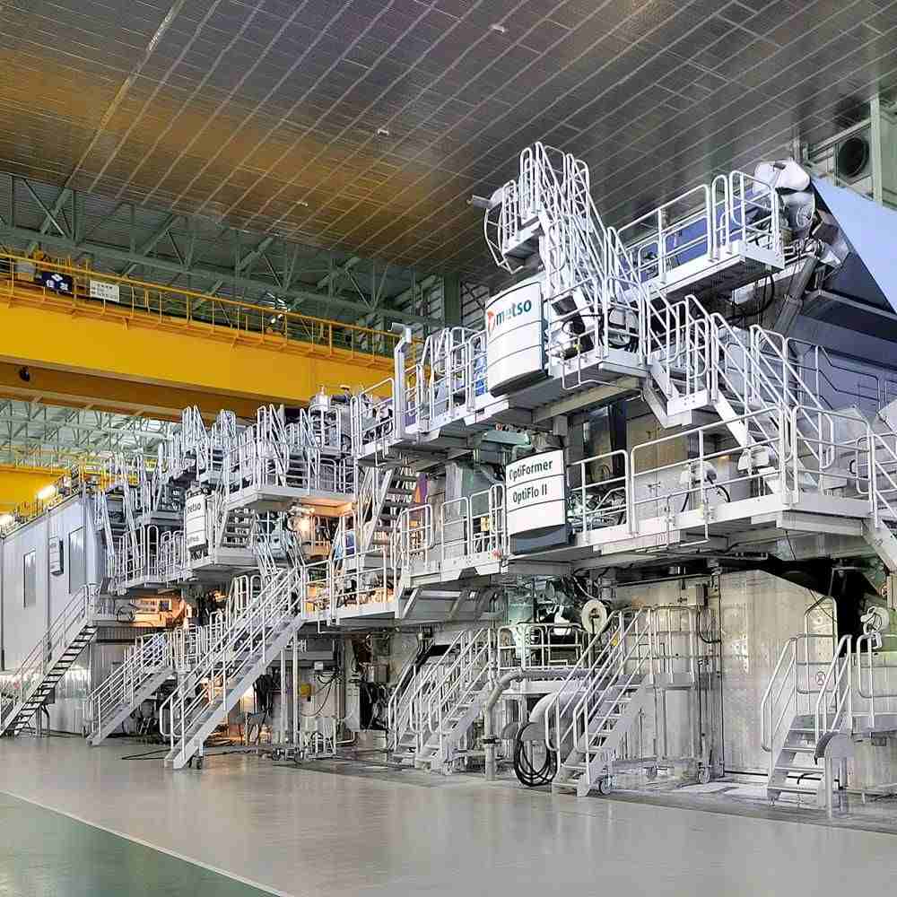 An intricate system of pipes and valves in a large industrial machine
